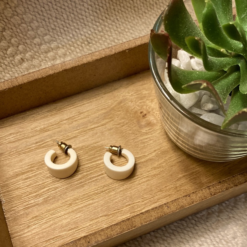 Small white earrings